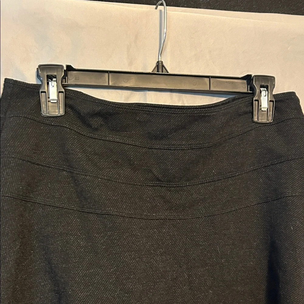 Athleta Black Mini Skirt (No Shorts) Zipper. Size 8 Fixed slight hole (Pictured) - Picture 5 of 11